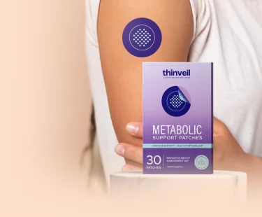 Thinveil patch worn on the upper arm next to the box